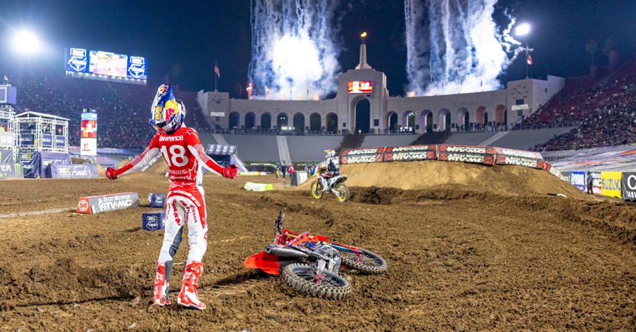 Jett Lawrence celebrates winning the 2023 SuperMotocross World Championship.