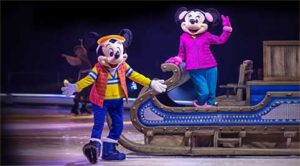 Mickey and Minnie Mouse on a sled