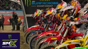 SMX riders lined up at the gate with the SMX logo