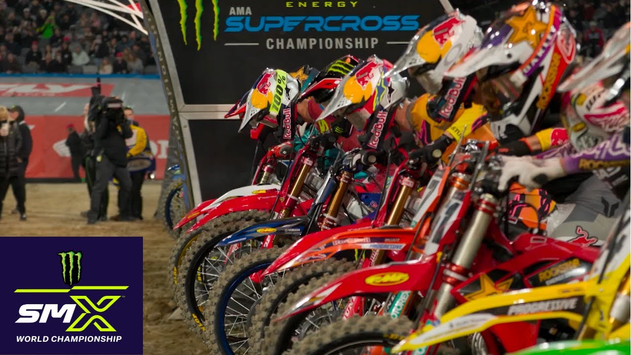 SMX riders lined up at the gate with the SMX logo