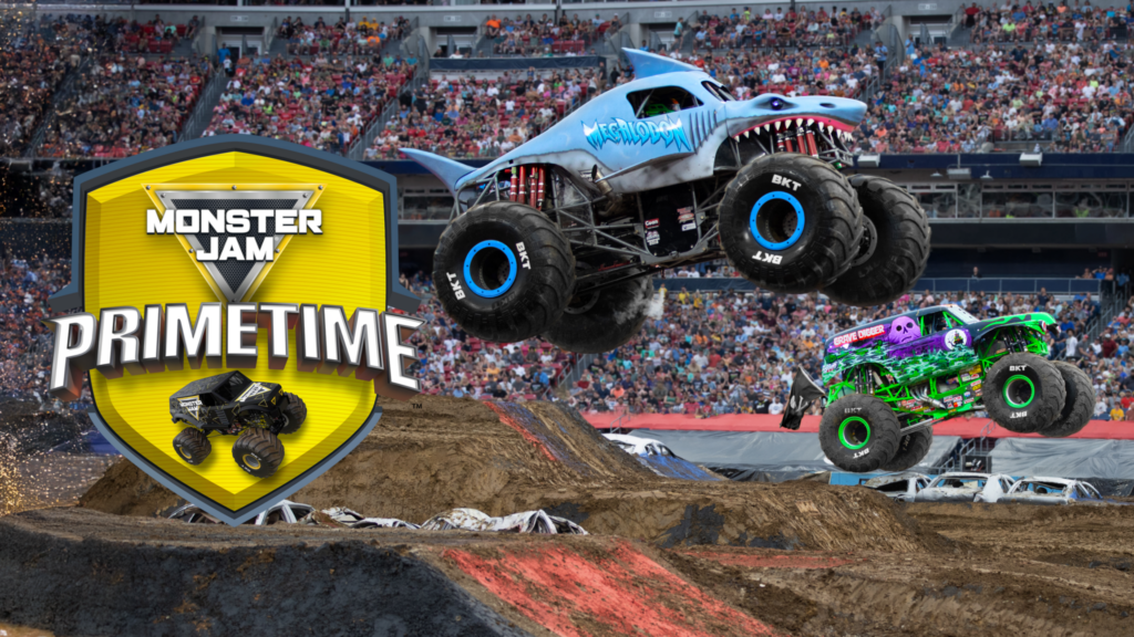 Photo of the Megalodon and Grave Digger Monster Jam trucks with the Monster Jam Primetime logo